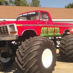 Monster Truck with "Sod Buster" on the door and "Bass Sod Farm" on windshield