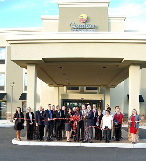 Comfort Inn exterior with employees