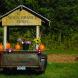 Quaint Farm Cart loaded with pumpkins and fall flowers