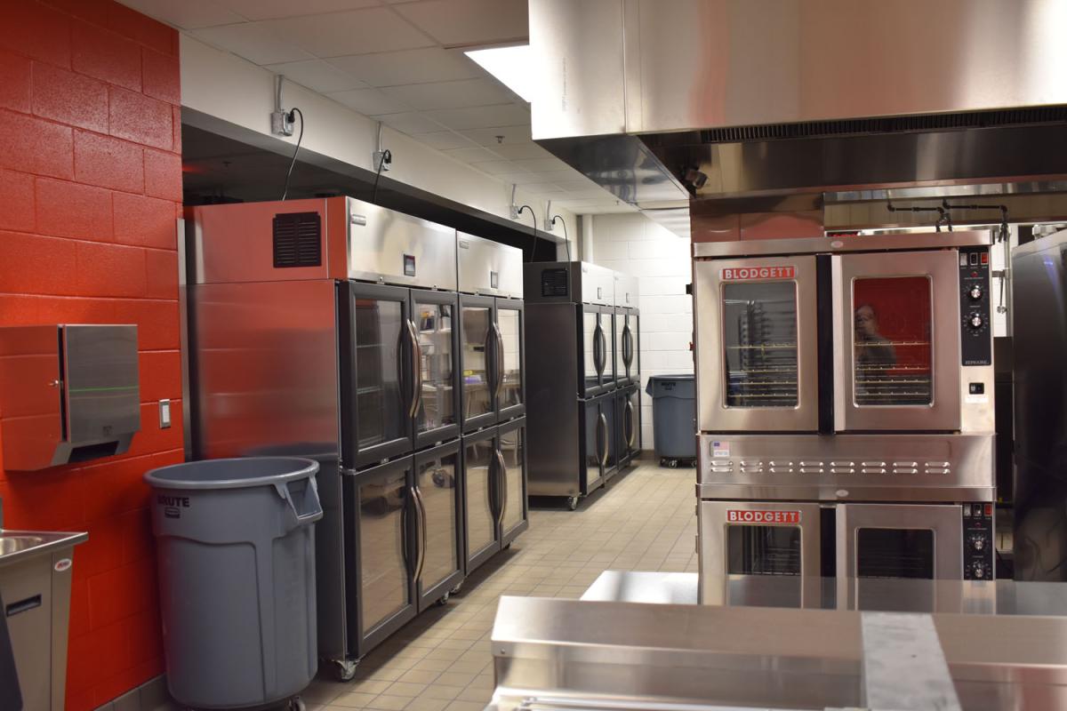 Stainless steel and windows are featured in the cafeteria equipment shown 