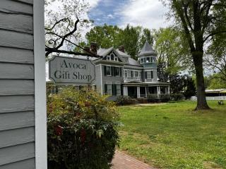 Exterior of Avoca Museum with Gift Show sign in foreground