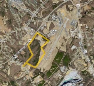 Aerial view of the airport area with the parcels from the grant highlighted in yellow