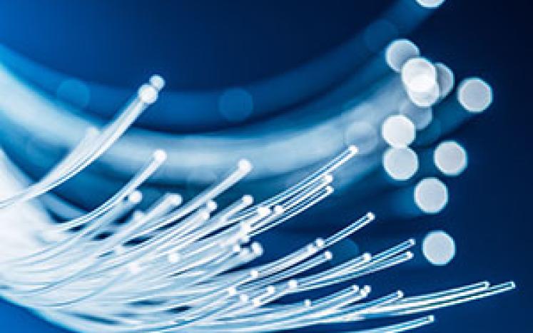 Fiber Optic wires on a blue background