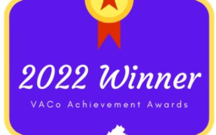 Purple hexagon with "2022 Winner VACo Achievement Awards" and logo